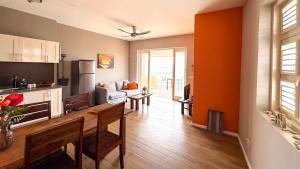 Spacious oceanview living and dining area of Apartment Soleil at Dushi Pietermaai Apartments Curaçao