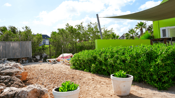 Spacious terrace at Dushi Pietermaai Apartments in Curaçao, showing comfortable outdoor area for guests with house manual essentials